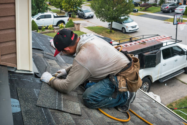 Professional Roofing technician working in Waban, MA